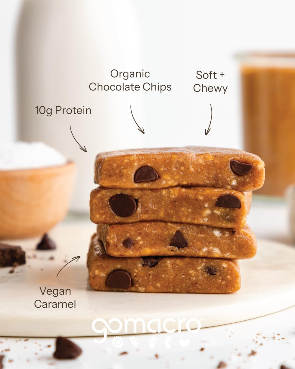 GoMacro bar in hand demonstrating portable size and on-the-go snack benefit