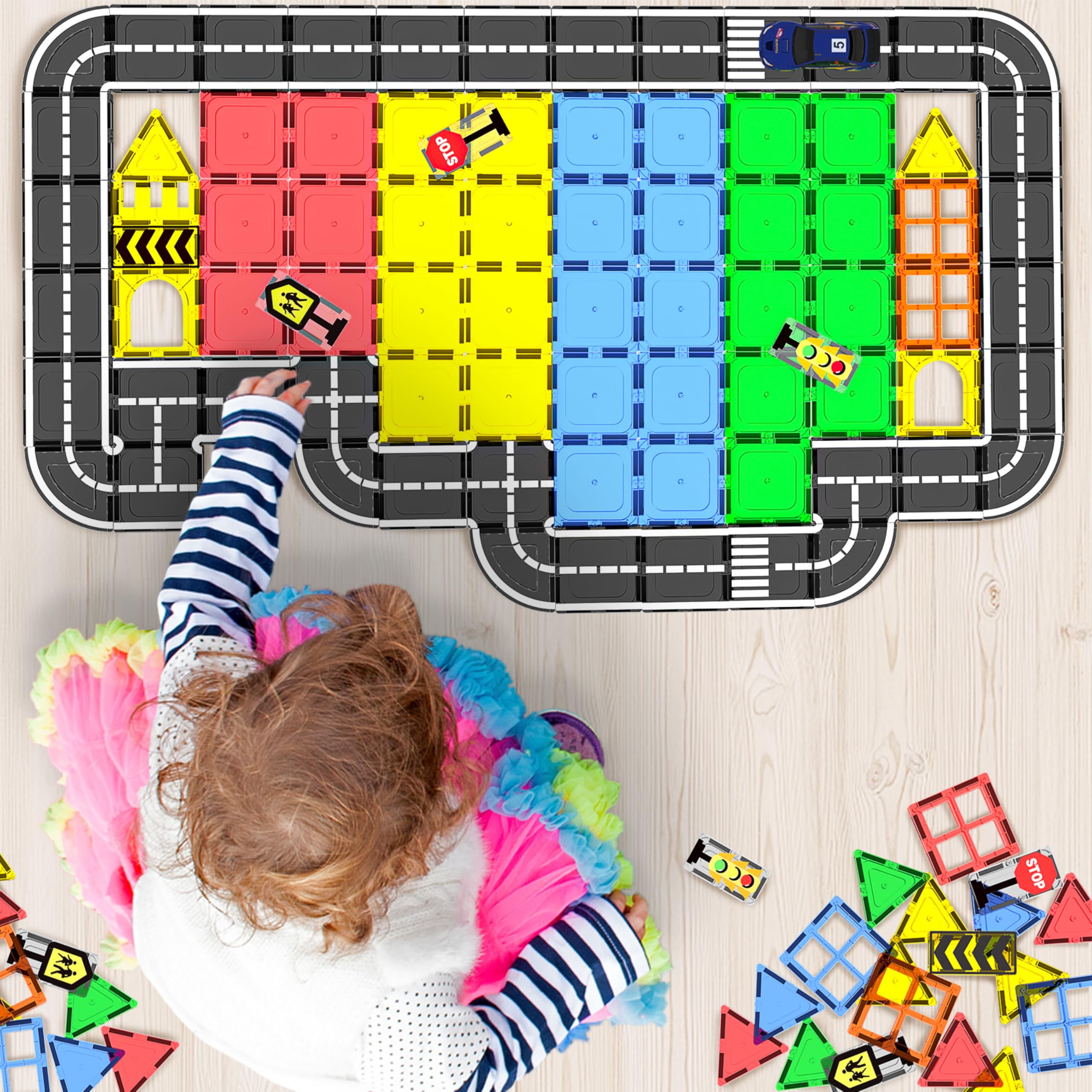 Goodtiles manos de niño montando calles, mejora motricidad fina