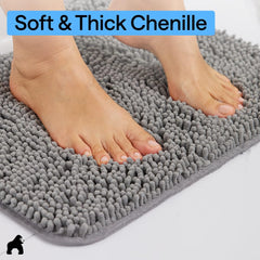 GORILLA GRIP en uso frente a la ducha absorbiendo agua rápidamente