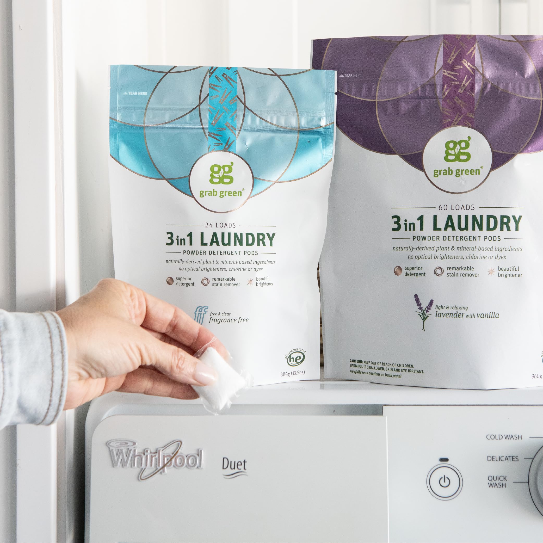 Laundry basket with folded clothes and Grab Green tub showing easy, fresh results
