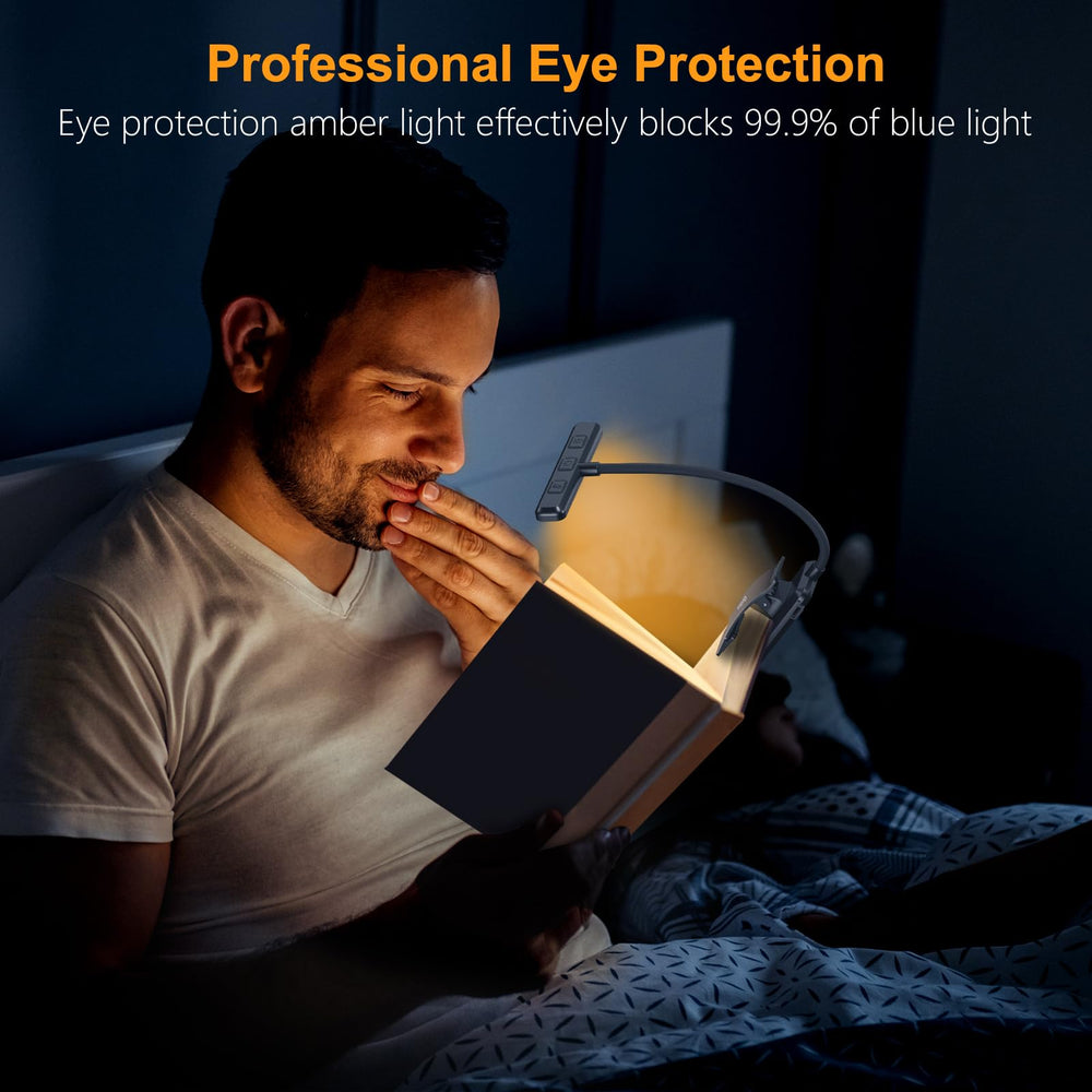 Gritin clip con almohadillas antideslizantes sujetando libro sin marcas