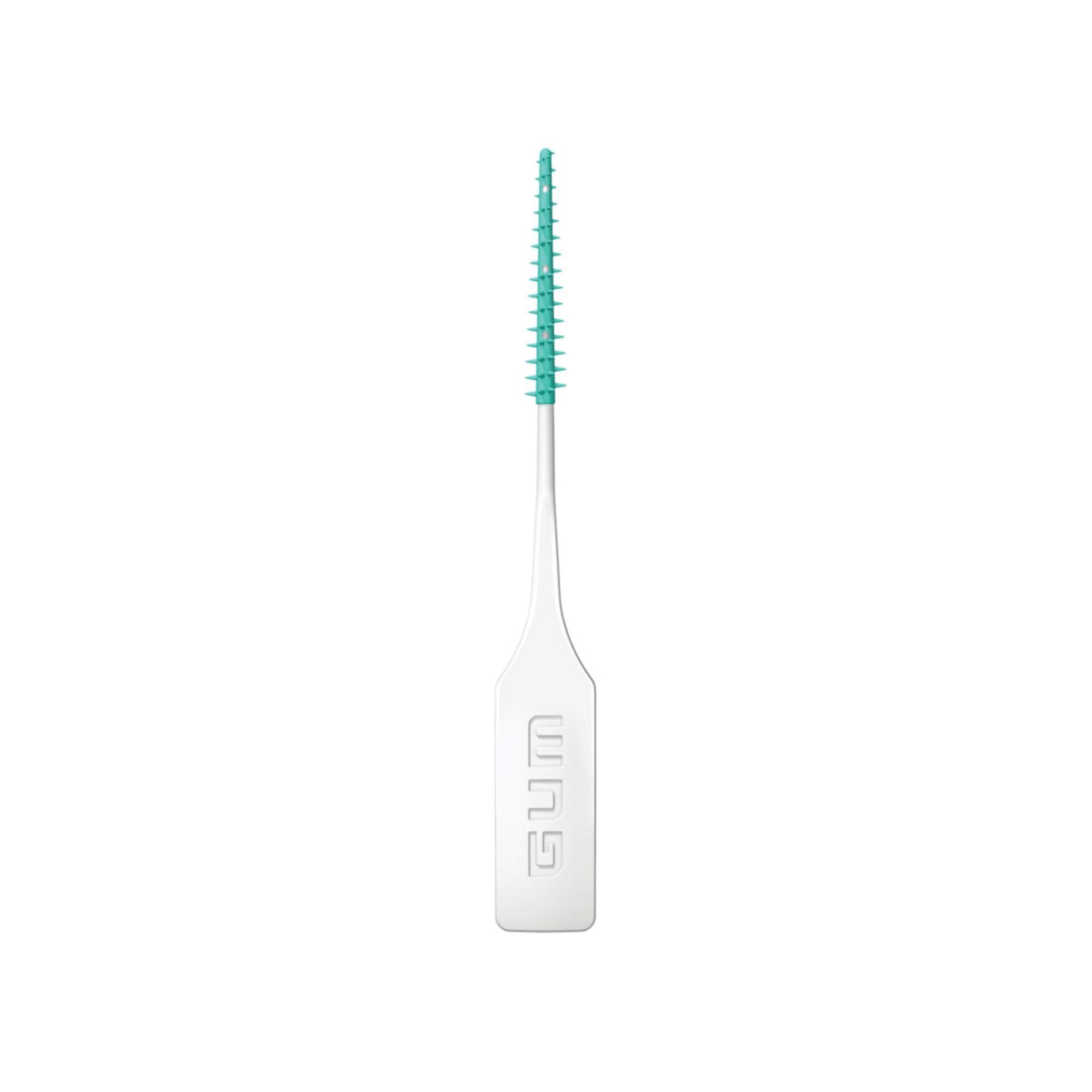 Gum palillo junto a moneda para comparar tamaño, discreción y soporte