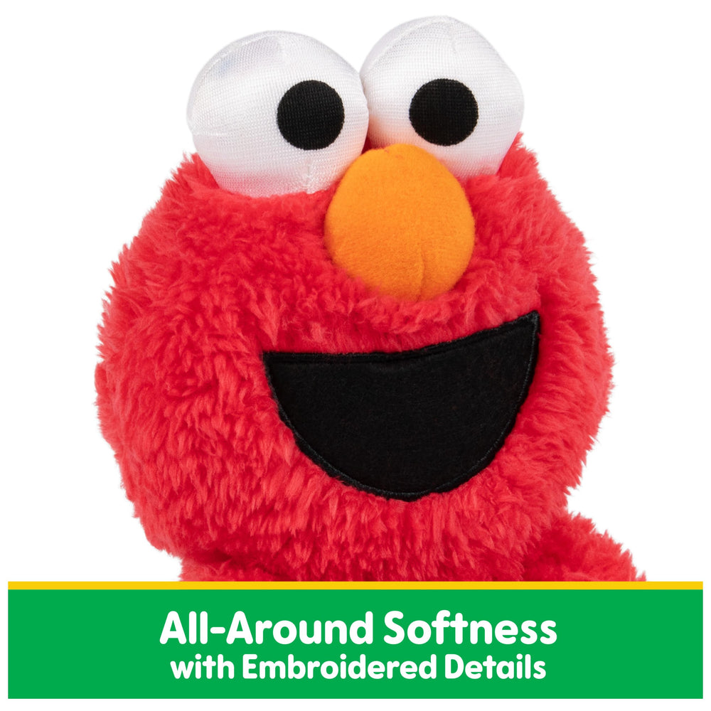 GUND Elmo en uso por niño disfrutando juego y confort