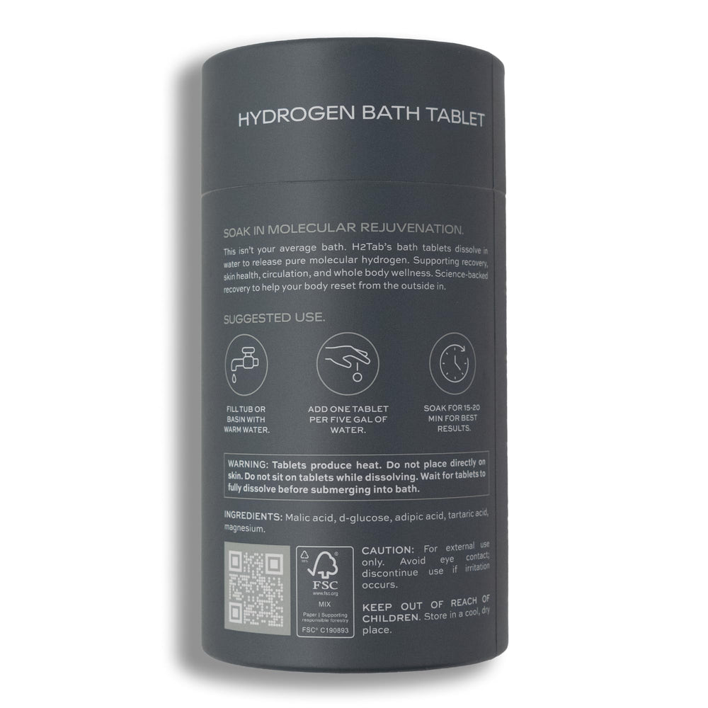 H2TAB ambiente de baño relajante con vela fomentando descanso y bienestar