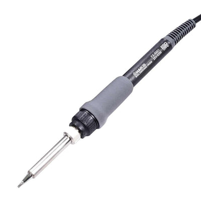 Hakko FX888DX comparación de escala en mesa para ver su tamaño compacto
