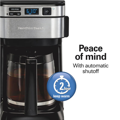 Hamilton Beach glass carafe pouring coffee onto a cup showing quick serve benefit