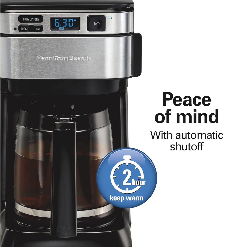 Hamilton Beach glass carafe pouring coffee onto a cup showing quick serve benefit