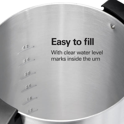 Hamilton Beach urn pouring coffee into travel mug for on-the-go convenience