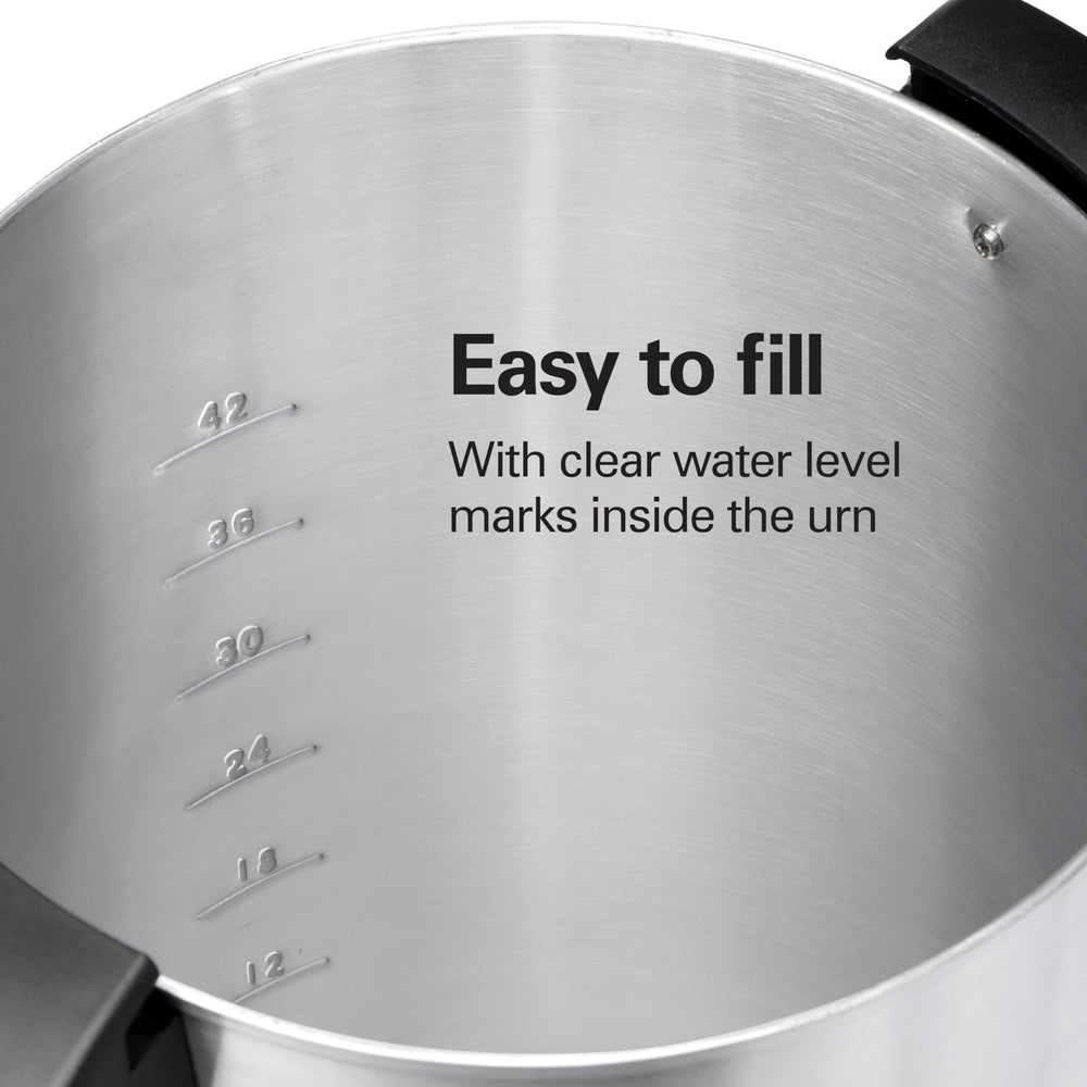 Hamilton Beach urn pouring coffee into travel mug for on-the-go convenience