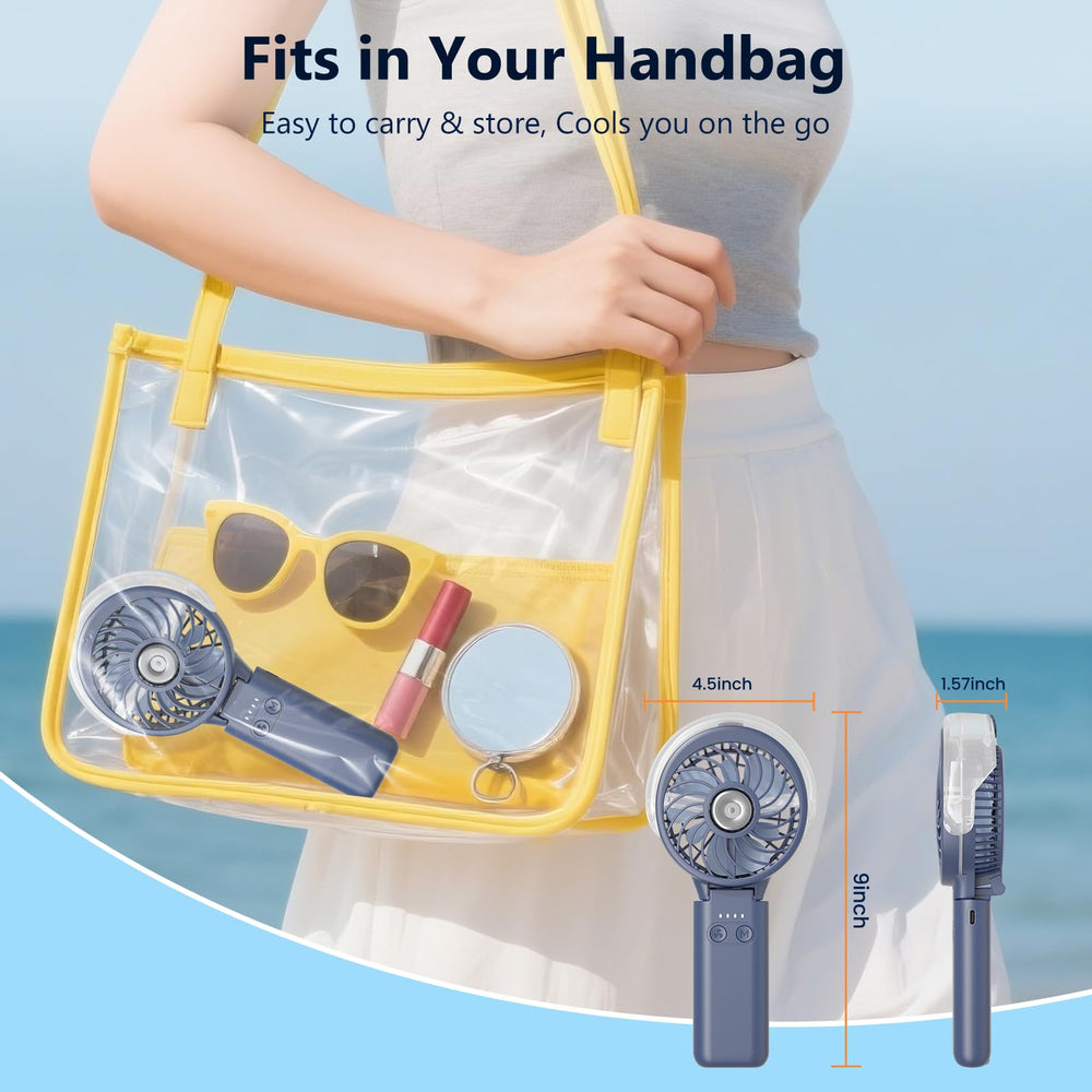 HandFan en la playa con usuario HandFan ideal para actividades al aire libre