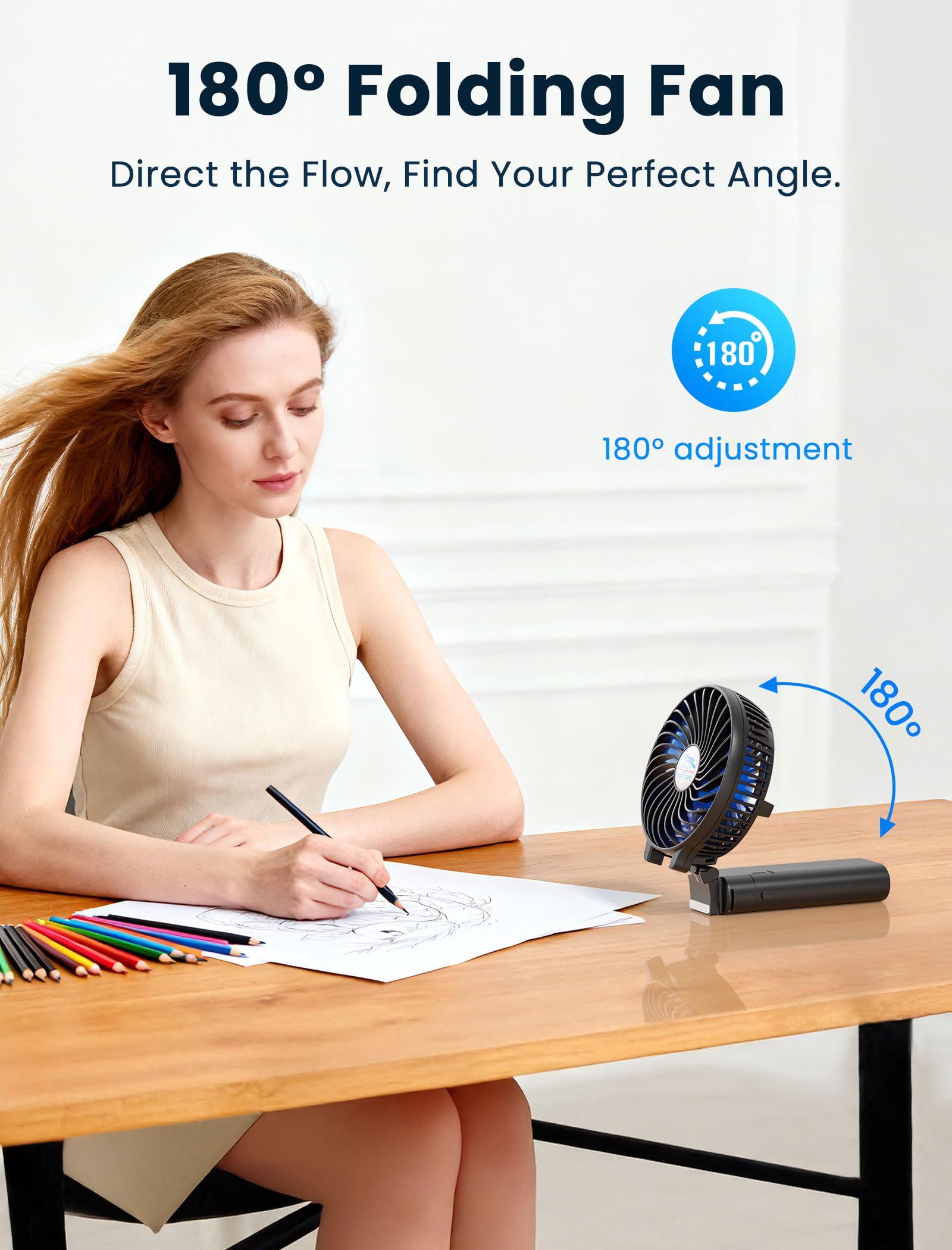 HandFan placed on desk at angle showing adjustable cooling for workspace benefit