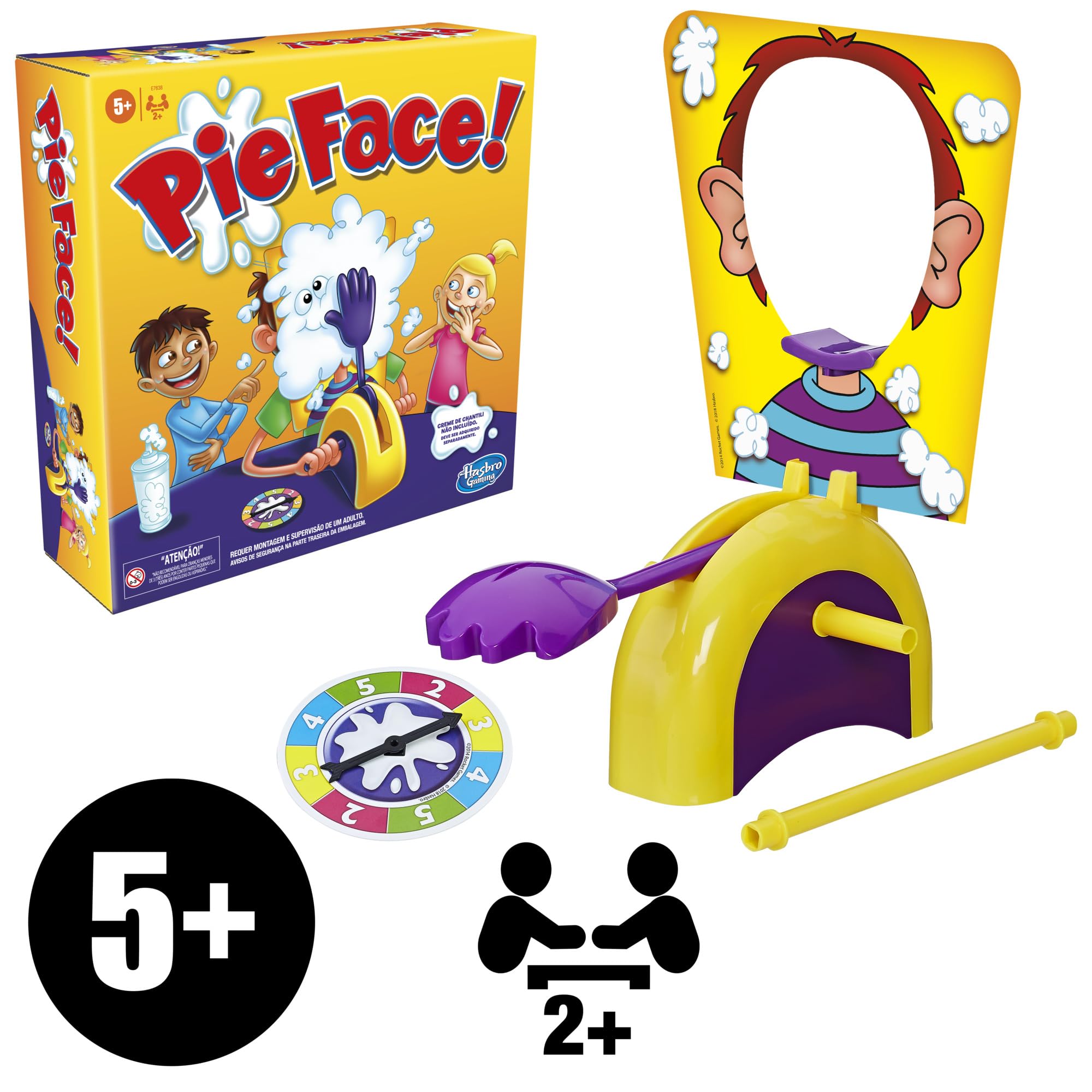 Hasbro Gaming piezas y caja junto a regla para escala, indica tamaño real