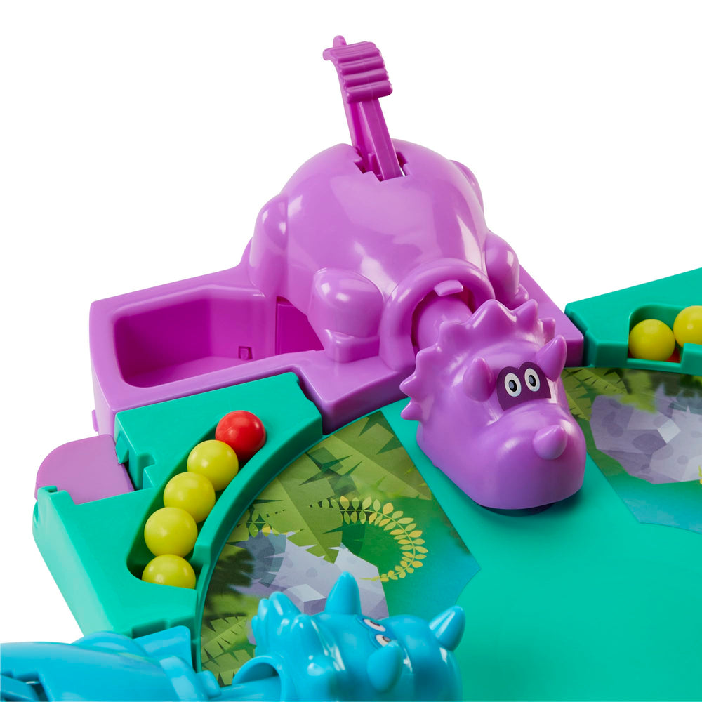 Hasbro dino foto con regla para comparar tamaño de las canicas y piezas robustas