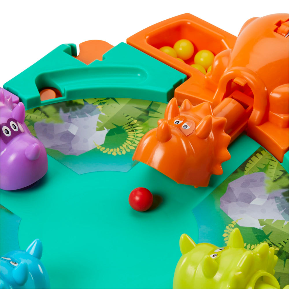 Hasbro dino caja y etiqueta del producto mostrando marca y edad recomendada