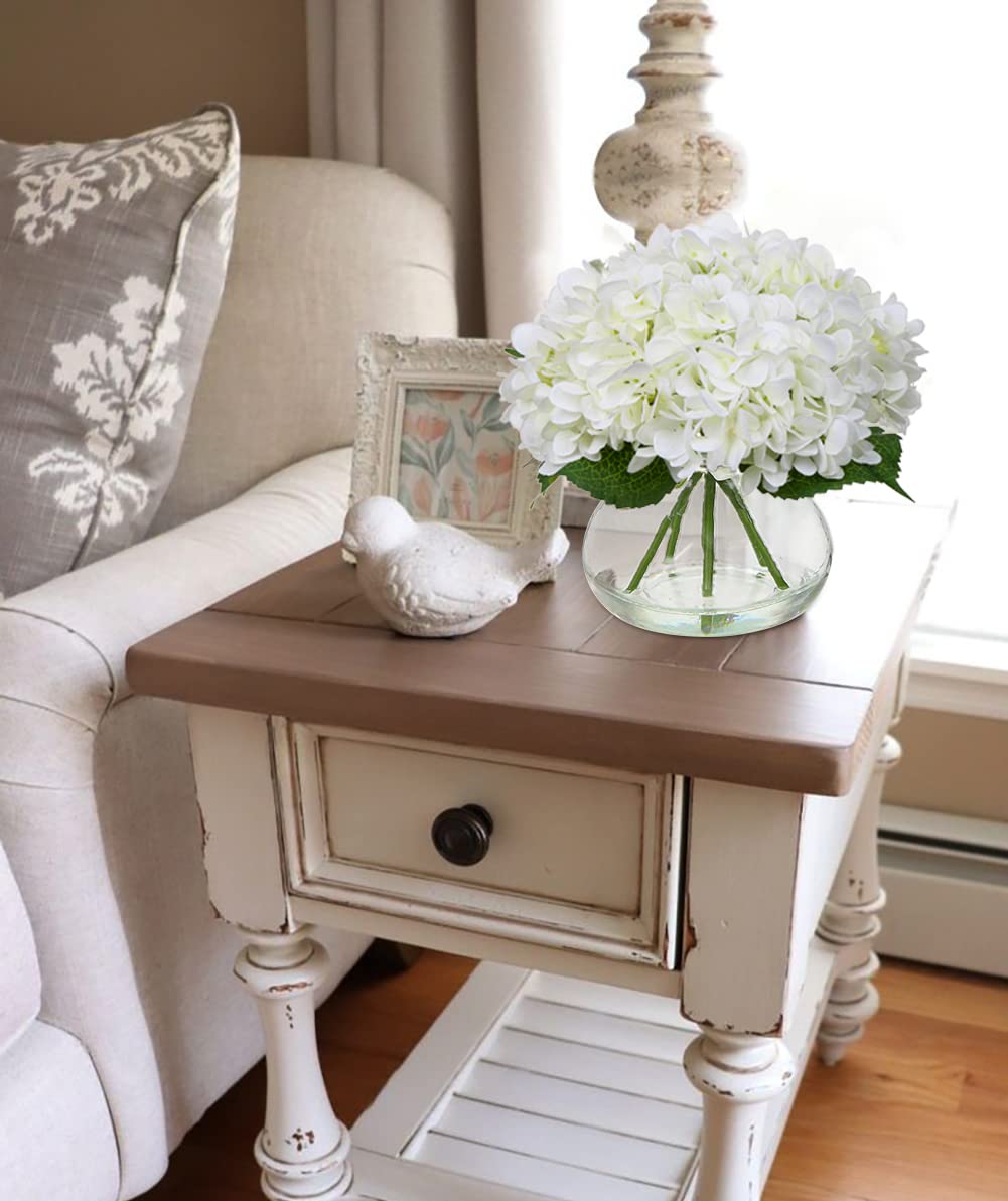 Hollyone arrangement in use on dining table creating low-maintenance charm