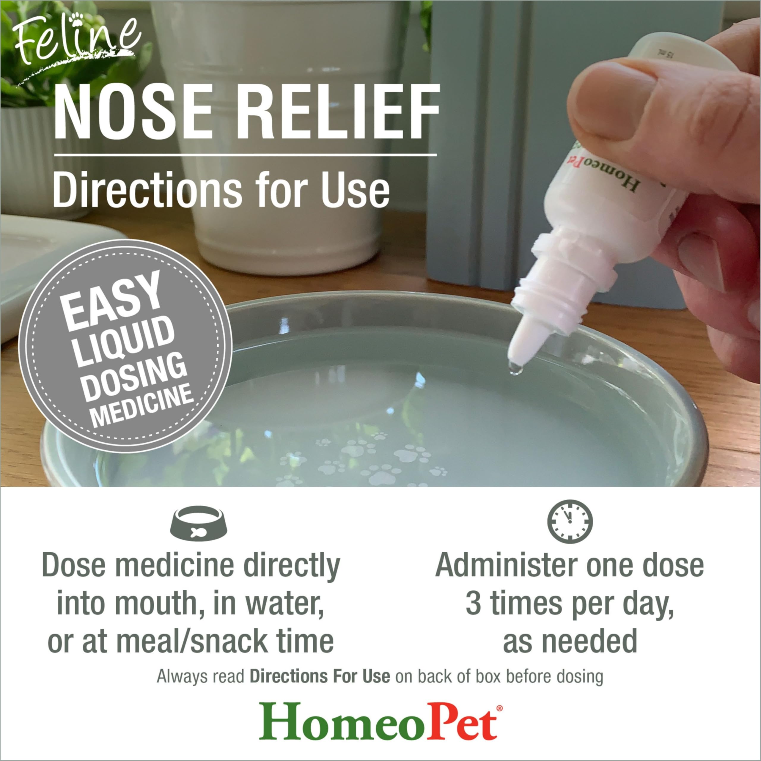 HomeoPet Feline Nose Relief junto a regla para comparar el tamaño compacto del frasco