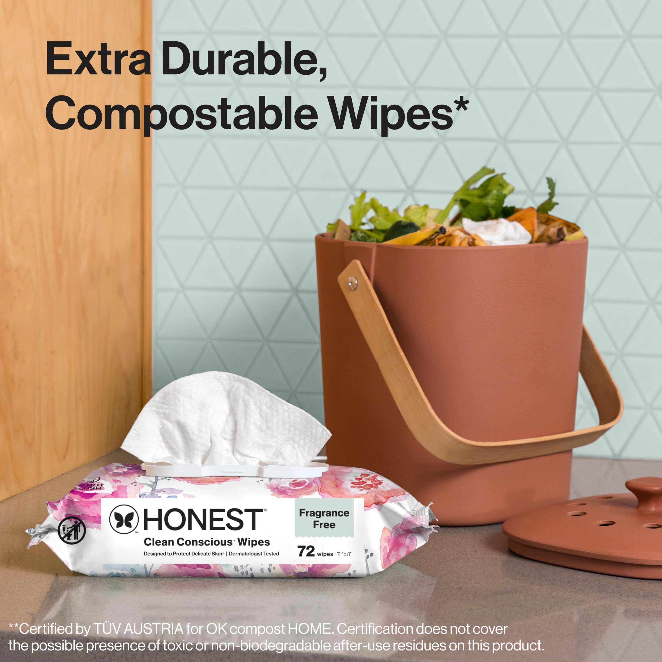 Wipes next to baby changing pad showing Honest Company convenience and cleanliness