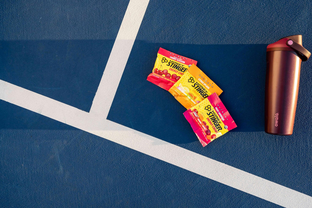 Honey Stinger masticables usados por corredor en ruta para energía sostenida
