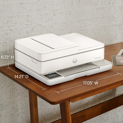 HP Envy 6555e setup with smartphone showing HP Smart app mobile printing benefit