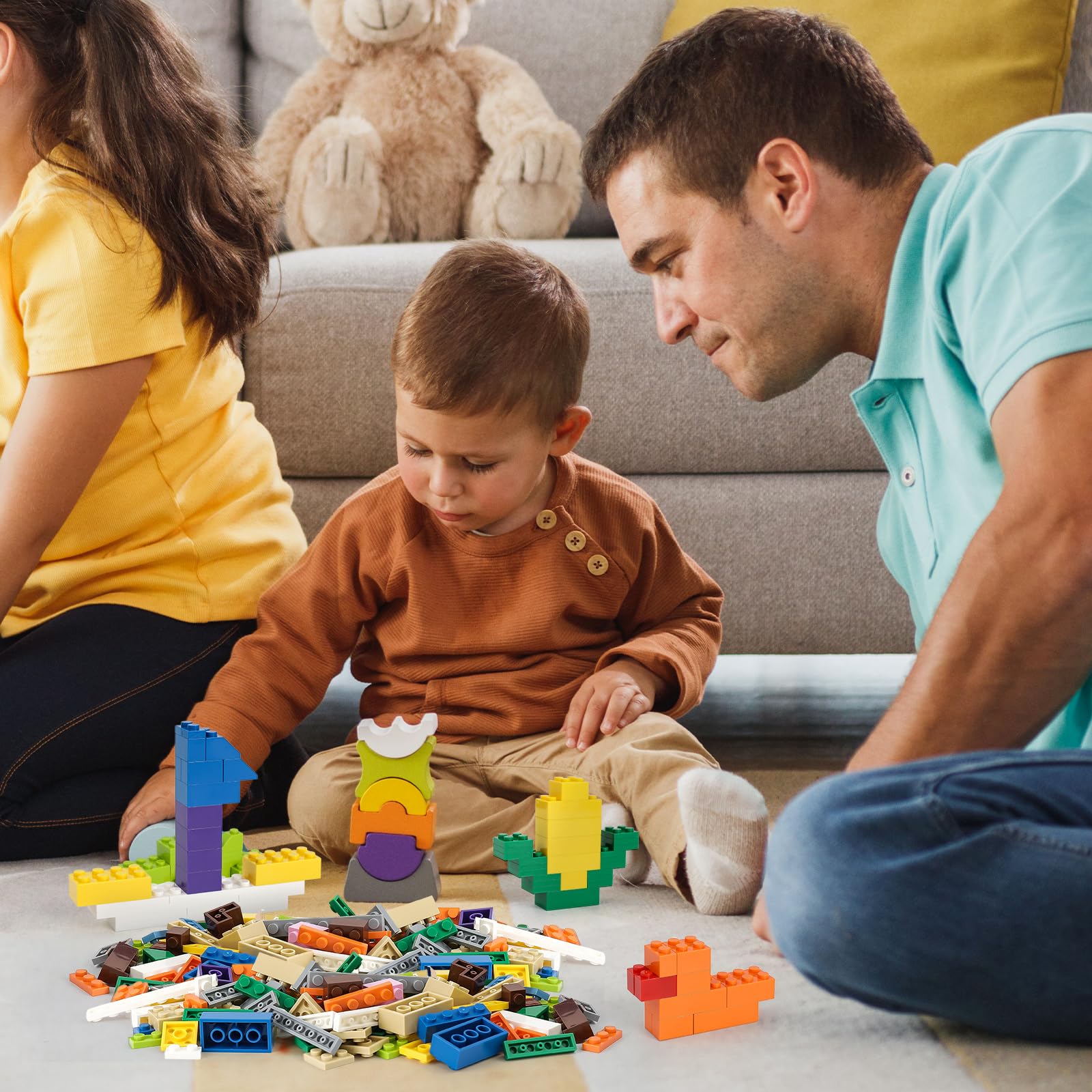 HUIZDQ niños en aula usando bloques para actividades grupales