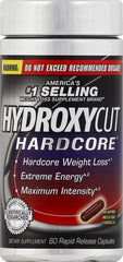 Hydroxycut persona tomando cápsula antes de entrenamiento para energía