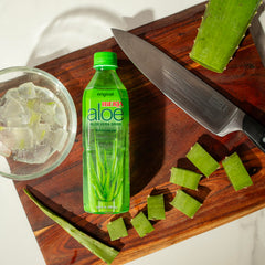 Iberia detalle de pulpa de aloe vera visible en la bebida para textura
