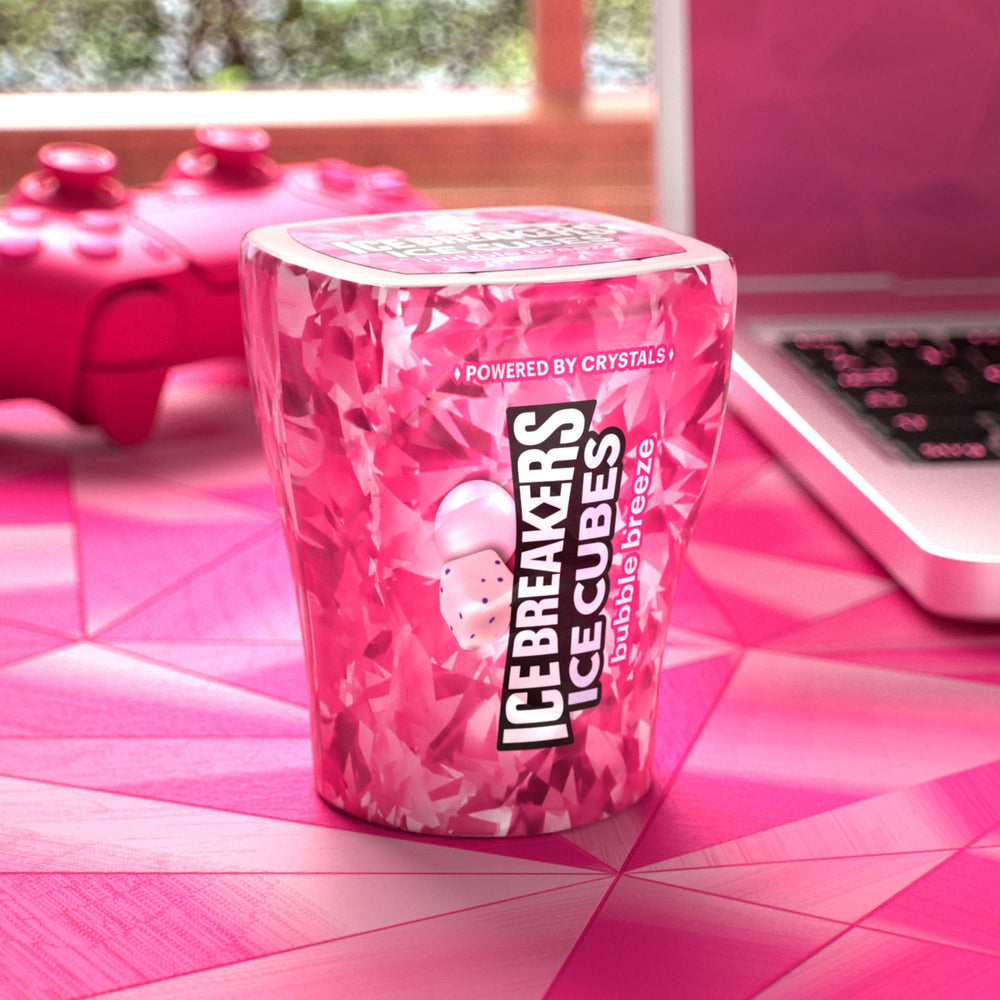 Ice Breakers bottle seated in car cup holder perfect for travel freshness and accessibility