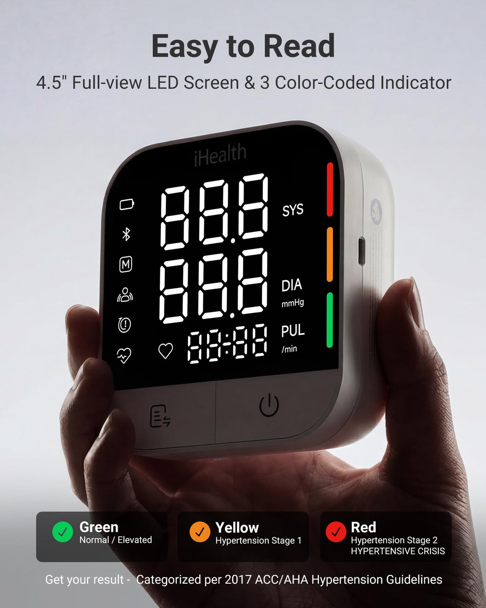 iHealth monitor junto a una regla para comparar tamaño y escala