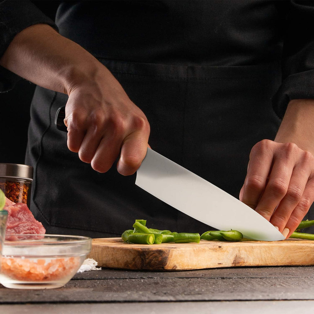 imarku cuchillo en acción cortando carne con cortes limpios y control