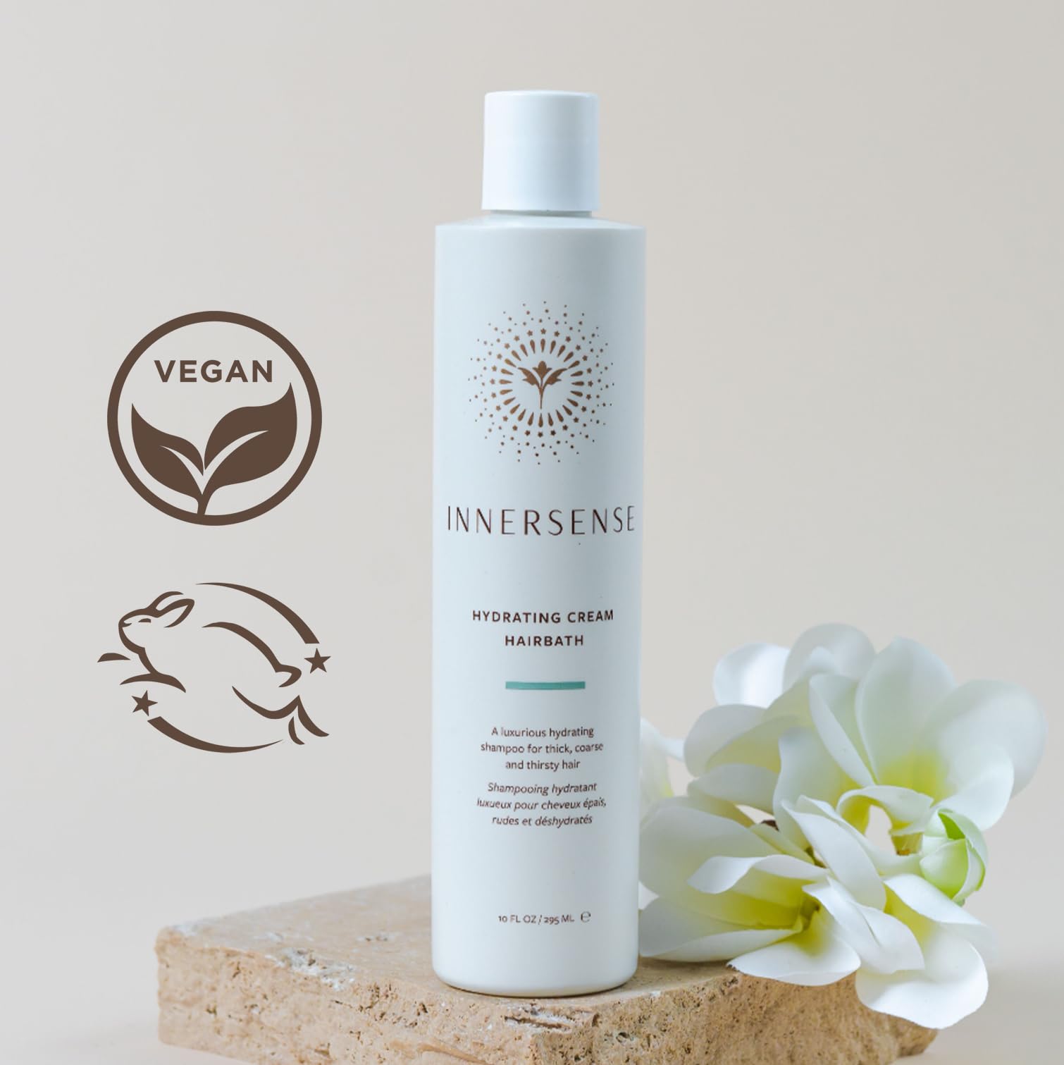 INNERSENSE shampoo in hand lathering to demonstrate gentle application