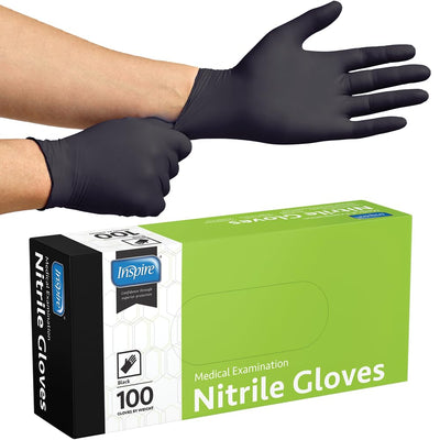 Tattoo artist wearing Inspire gloves working on a client showing professional protection
