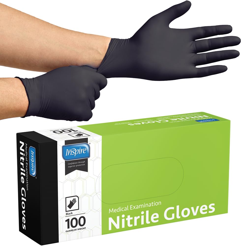Tattoo artist wearing Inspire gloves working on a client showing professional protection