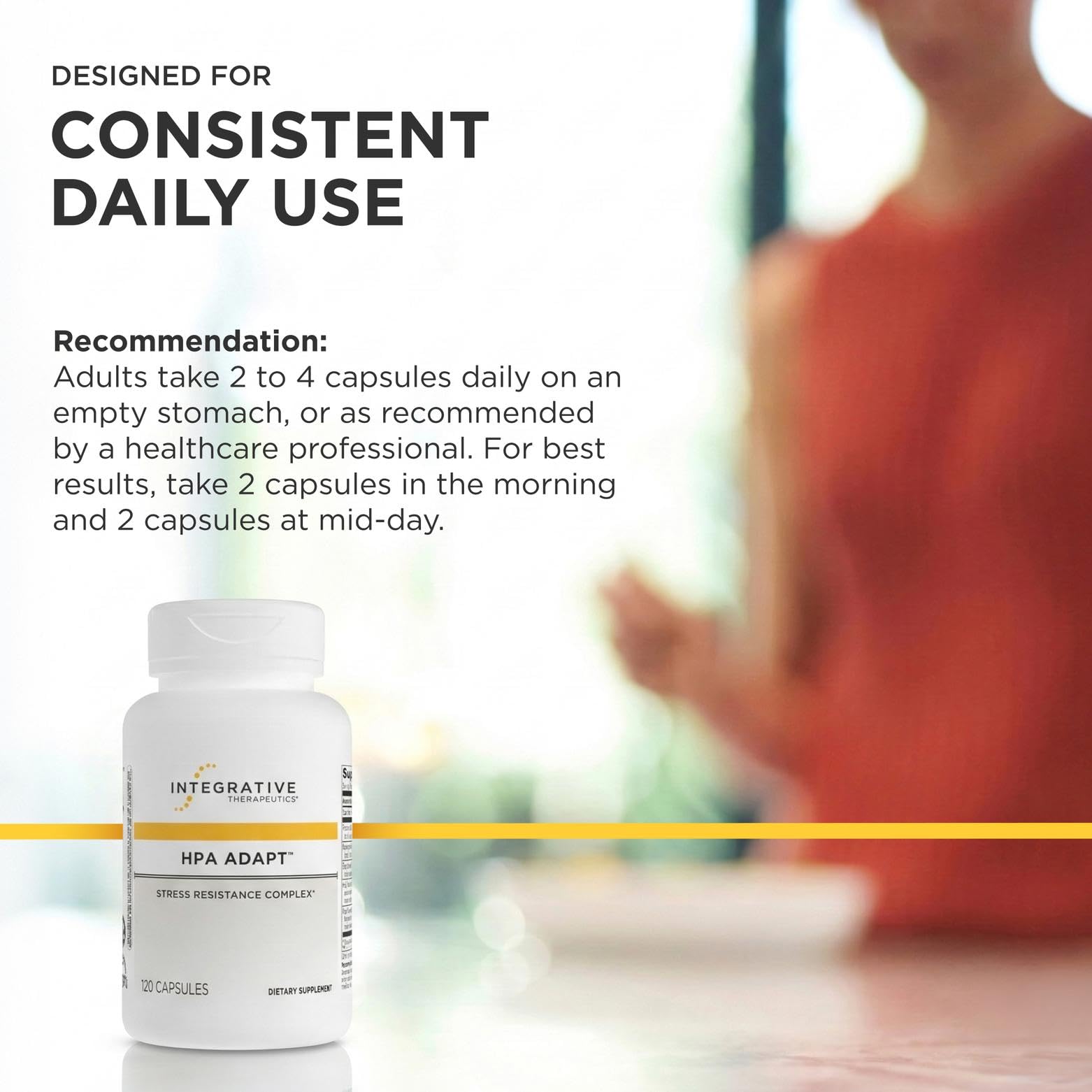 Integrative Therapeutics botella HPA Adapt en una mesa junto a libros y agua para uso diario