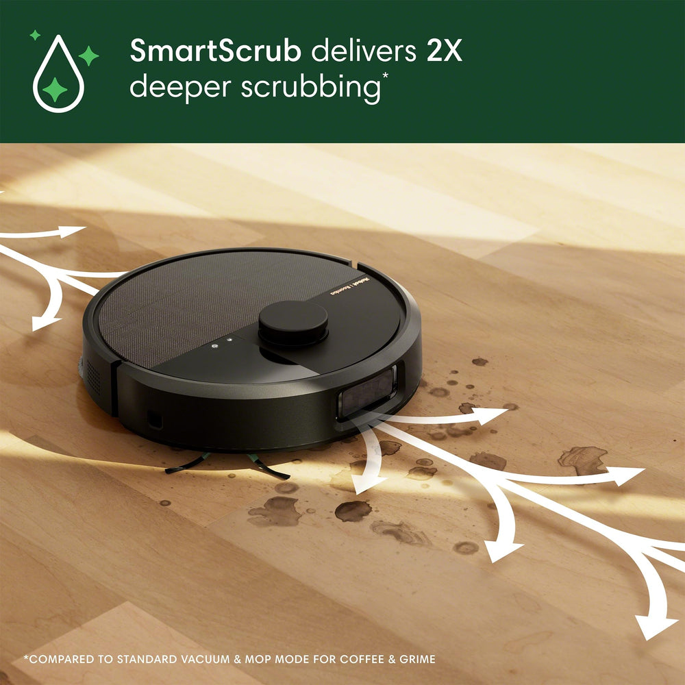 iRobot Roomba Plus 505 mopping in a kitchen removing spills and crumbs