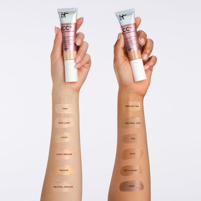IT Cosmetics tube beside a coin showing 1.08 fl oz size and portability