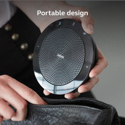 Jabra Speak 510 beside a smartphone showing compact size and transport benefit