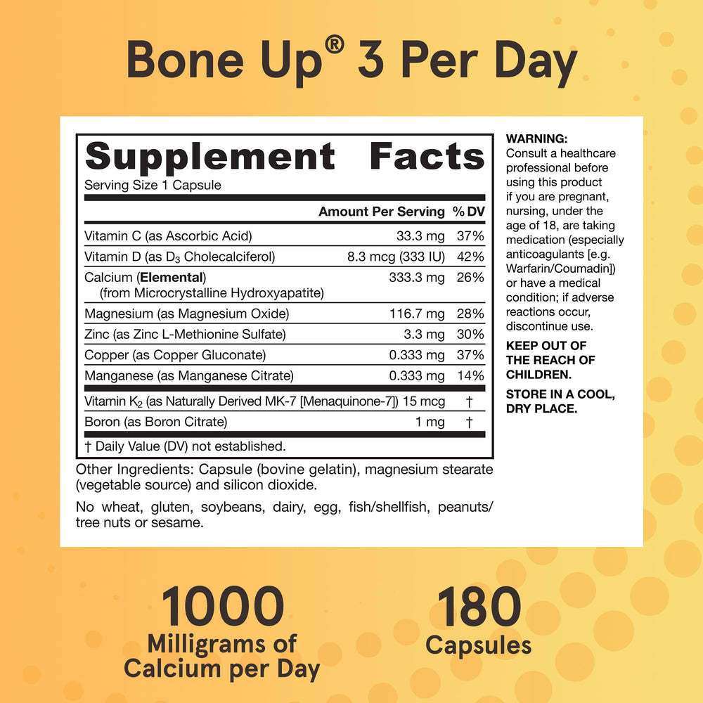 Jarrow Formulas BoneUp opened bottle with capsules spilling out to show daily serving accessibility