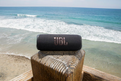 JBL Flip 6 side controls showing buttons and easy playback control