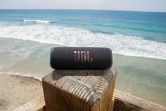 JBL Flip 6 side controls showing buttons and easy playback control