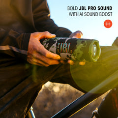 JBL Flip 7 held in hand to show compact size and easy portability benefit
