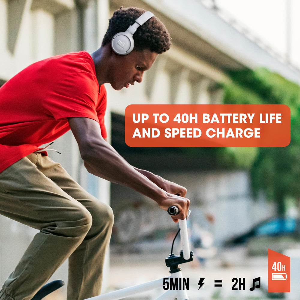 JBL Tune 510BT worn on head demonstrating adjustable band for secure comfort