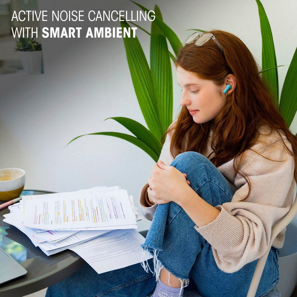 JBL Vibe Beam 2 worn in ear during call showing secure fit and clear voice pickup