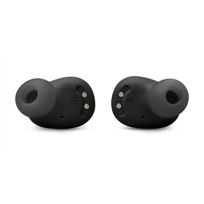 JBL earbuds in hand for size comparison showing pocketable portability