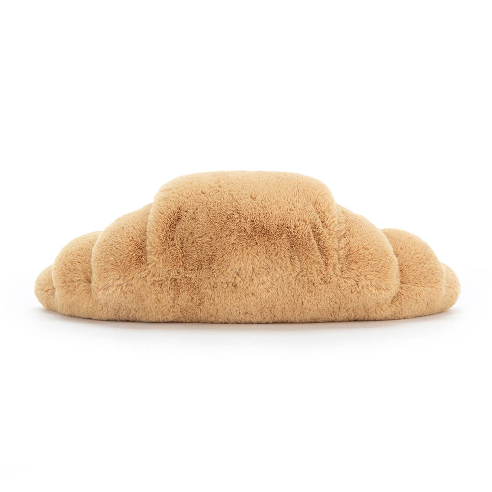Jellycat croissant etiqueta de marca y acabado artesanal visible