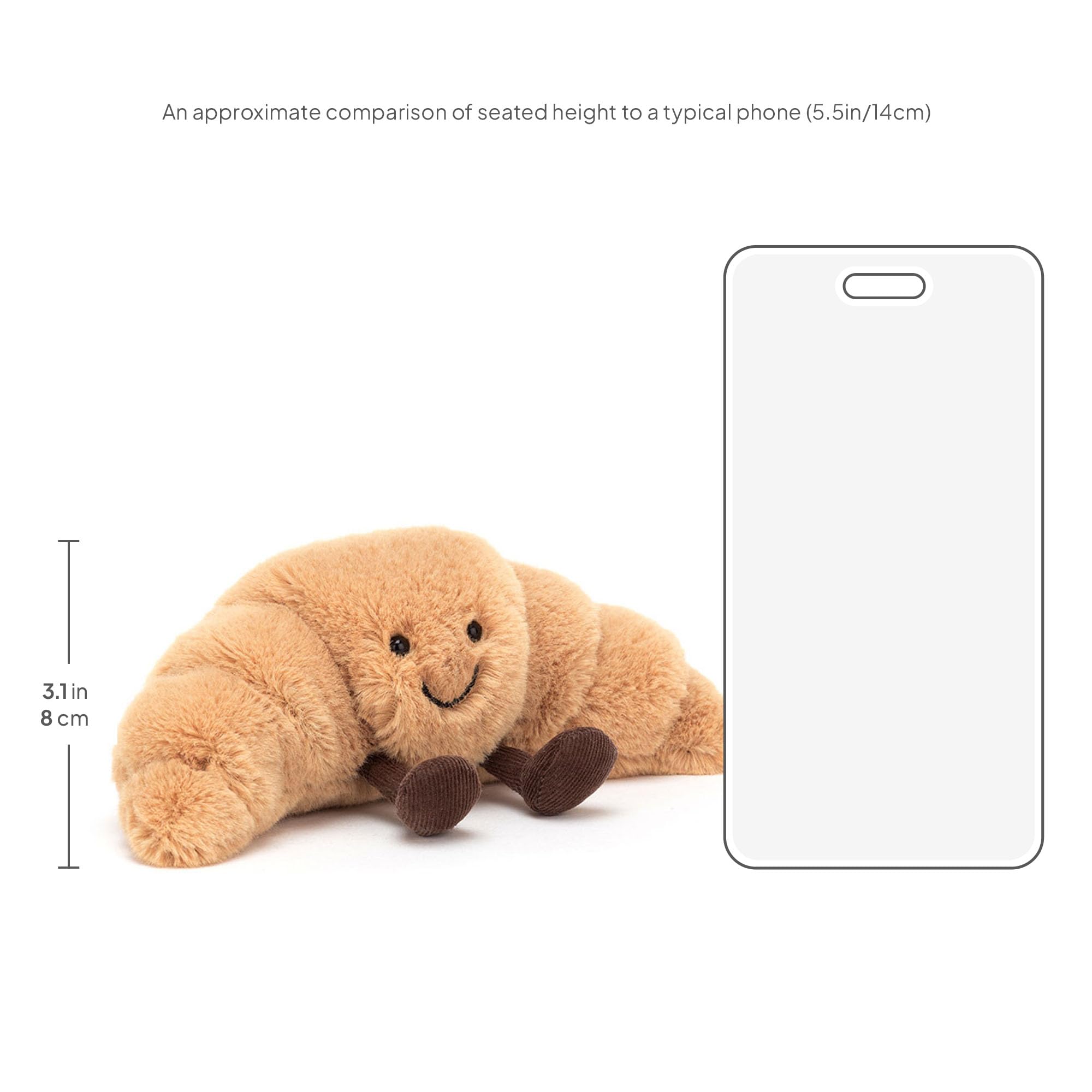 Jellycat croissant primer plano de tejido que resalta la suavidad