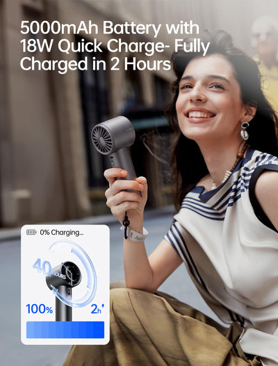 JISULIFE Pro1S held in hand showing scale and portable cooling benefit