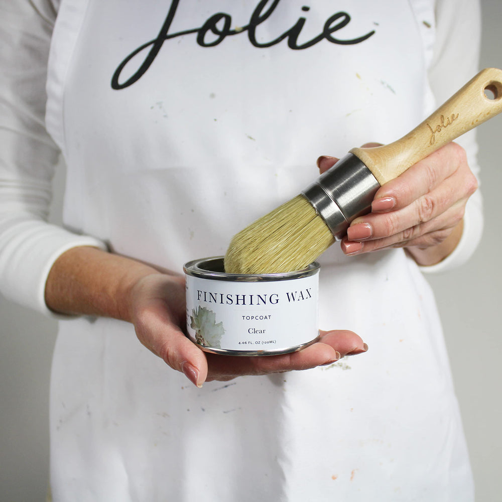 Jolie 120ml held in hand showing compact size and convenient touch-up use