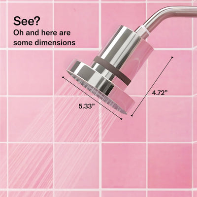 Jolie Skin Company showerhead next to a hand to show scale and easy handling