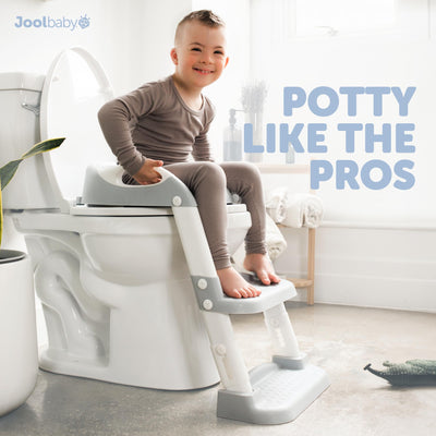 jool baby toddler climbing ladder showing confident, supervised use in bathroom