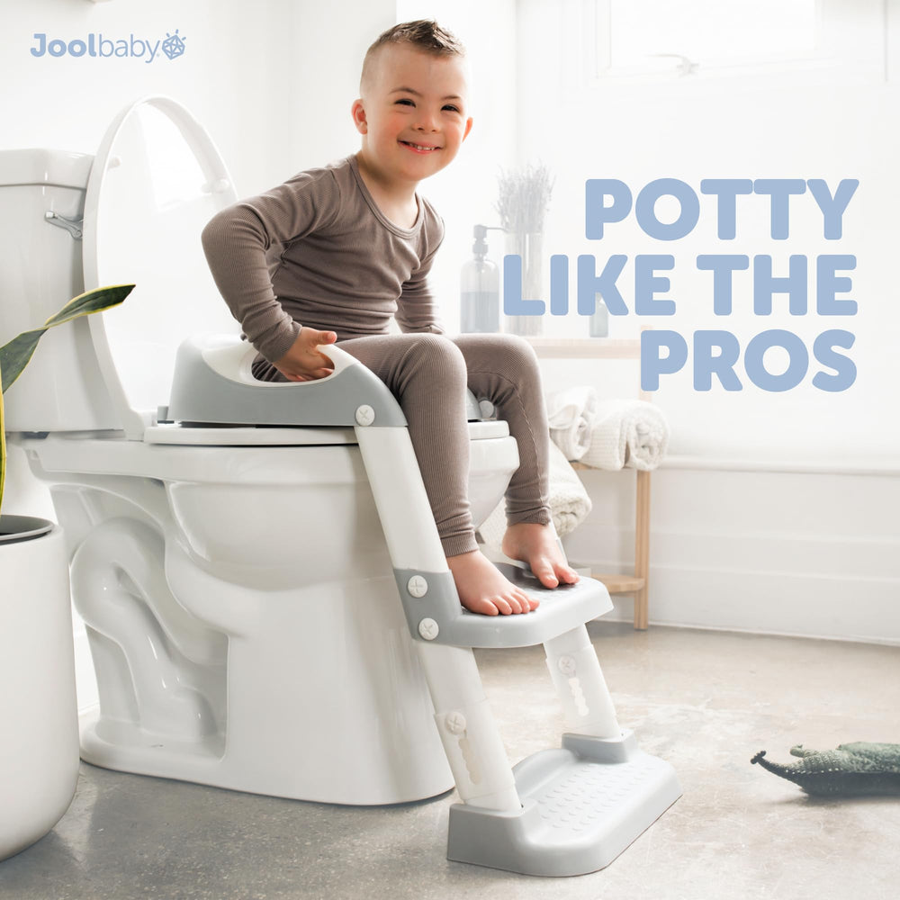 jool baby toddler climbing ladder showing confident, supervised use in bathroom